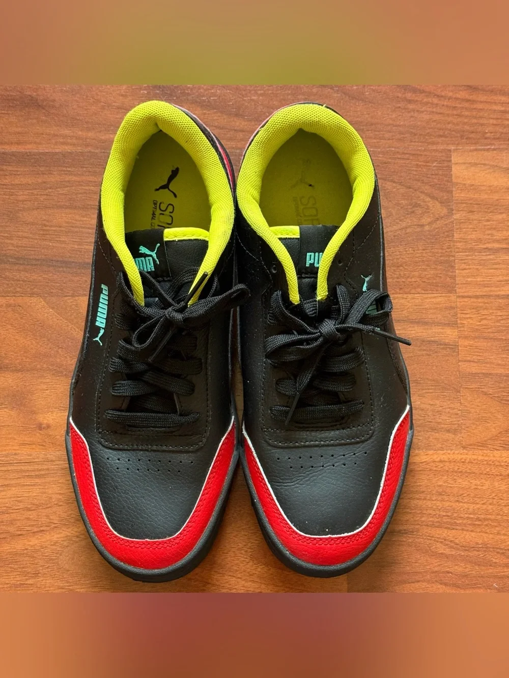 Puma Caracal sneakers men's size 7.5 women's size 9 black high-risk red nrgy